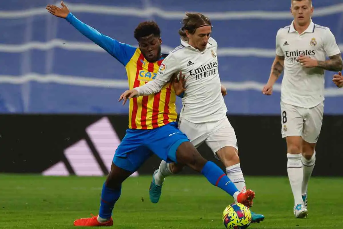 Musah in contrasto con Modric